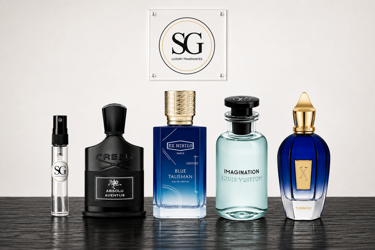 Luxury fragrance bottles with Creed Aventus Absolu, Ex Nihilo Blue Talisman, Louis Vuitton Imagination and Torino21