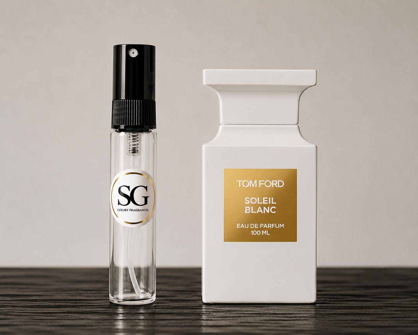 Tom Ford Soleil Blanc perfume bottle and sample on a wooden surface with a neutral background
